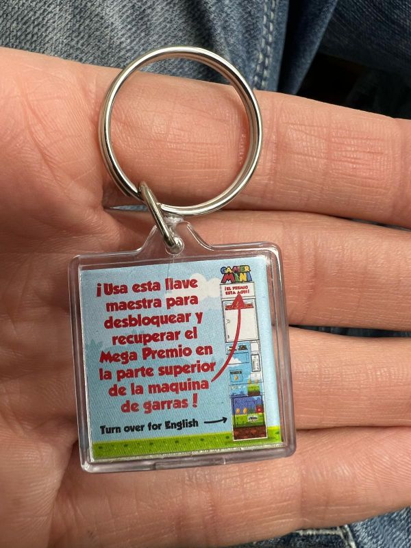 Instruction keychain for Claw Machine with prize box up top